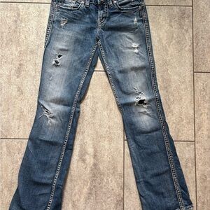 Silver Jeans Classic Distressed Boot Cut in Blue